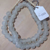 Hand made clear colored recycled beads by master artisans.