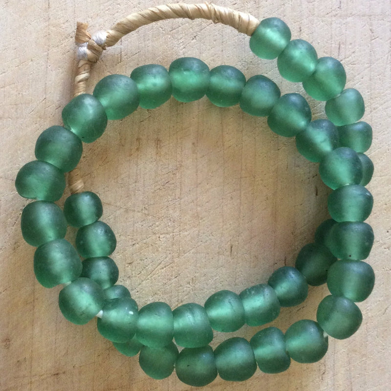 Hand made sage colored recycled beads by master artisans.