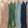 Hand made recycled beads by master artisans in many colors.